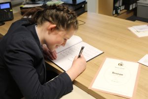 Writing in the Headteacher's Book of Excellence